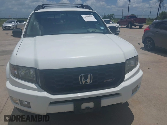 2014 Honda Ridgeline Sport with VIN 5FPYK1F71EB011340, listed as a IAAI auction lot 42741956 with 156,149 mi miles and . Bid and sale history available at DreamBid. Image 6.