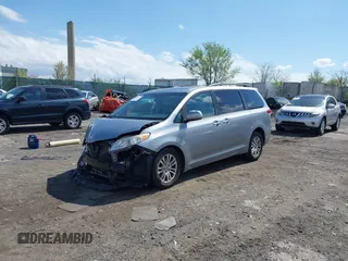2013 Toyota Sienna XLE AAS with VIN 5TDYK3DC5DS375095, listed as a IAAI auction lot 42042334 with 130,633 mi miles. Bid and sale history available at carsss.com. Image 17.