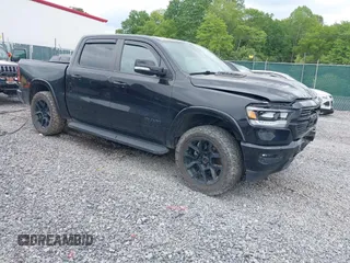 2021 Ram 1500 Laramie with VIN 1C6SRFJT5MN732344, listed as a IAAI auction lot 42285790 with 81,641 mi miles and . Bid and sale history available at DreamBid. Image 1.