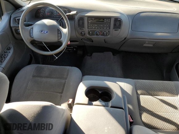 2003 Ford F-150 XLT with VIN 1FTRW08673KA38056, listed as a Copart auction lot 42772435 with 129,104 mi miles and Salvage Title. Bid and sale history available at carsss.com. Image 8.