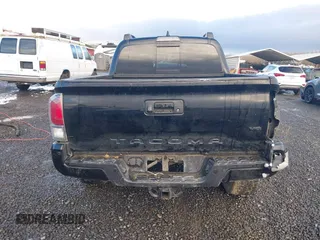 2020 Toyota Tacoma SR5 z VIN 5TFCZ5AN9LX216032, wystawiony jako IAAI lot #41448197 z przebiegiem 128 581 mil mil oraz . Historia ofert i sprzedaży dostępna na DreamBid. Obrazek 17.