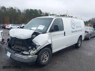 2018 GMC Savana Cargo Van with VIN 1GTW7AFGXJ1910704, listed as a IAAI auction lot 40924087 with 142,697 mi miles. Bid and sale history available at carsss.com. Image 2.