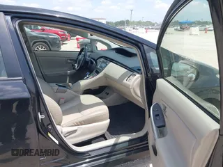 2014 Toyota Prius Four z VIN JTDKN3DU0E0384197, wystawiony jako IAAI lot #42519799 z przebiegiem 511 035 mil mil oraz . Historia ofert i sprzedaży dostępna na DreamBid. Obrazek 5.