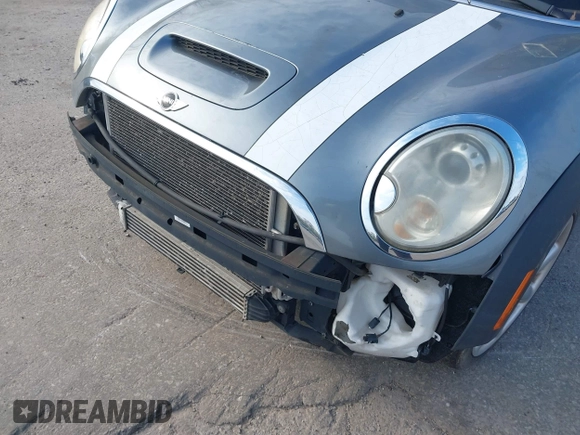 2008 MINI Hardtop S with VIN WMWMF73558TT87605, listed as a IAAI auction lot 41940226 with 113,595 mi miles and . Bid and sale history available at DreamBid. Image 6.