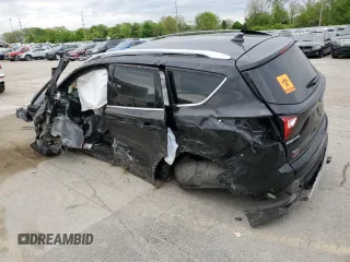 2019 Ford Escape Titanium с VIN 1FMCU9J92KUA82033, выставлен на аукционе Copart как лот 56686235 с пробегом Не указан миль и Списание • Salvage title. История ставок и продаж доступна на DreamBid. Изображение 2.