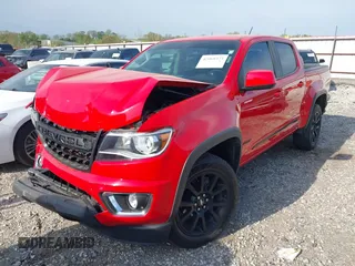 2020 Chevrolet Colorado 4WD LT with VIN 1GCGTCEN8L1106478, listed as a IAAI auction lot 42060373 with 68,753 mi miles and . Bid and sale history available at DreamBid. Image 2.