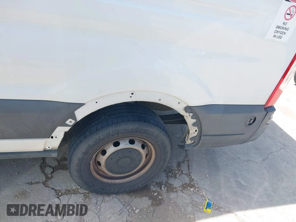 2015 Ford Transit Cargo with VIN 1FTNE2CMXFKA06516, listed as a IAAI auction lot 41650498 with 281,654 mi miles and . Bid and sale history available at carsss.com. Image 21.