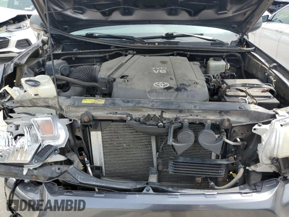 2013 Toyota Tacoma z VIN 5TFUU4EN5DX058037, wystawiony jako Copart lot #58387535 z przebiegiem 110 564 mil mil oraz Szkoda całkowita • Salvage title. Historia ofert i sprzedaży dostępna na DreamBid. Obrazek 11.
