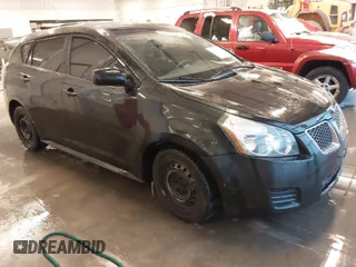 2010 Pontiac Vibe w/1SB with VIN 5Y2SP6E02AZ410781, listed as a IAAI auction lot 40984876 with 235,317 mi miles. Bid and sale history available at carsss.com. Image 1.