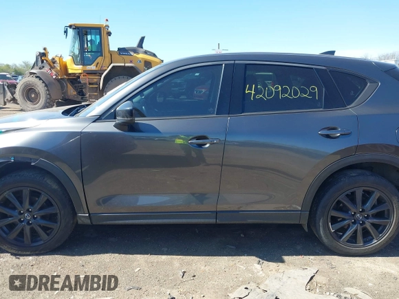 2017 Mazda CX-5 Grand Touring with VIN JM3KFBDLXH0225634, listed as a IAAI auction lot 42092029 with 86,373 mi miles and . Bid and sale history available at carsss.com. Image 14.
