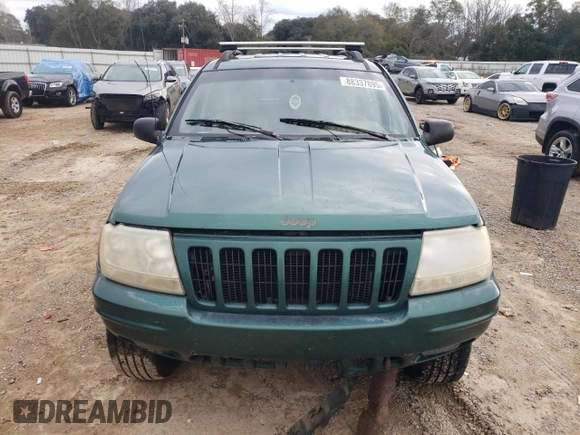 1999 Jeep Grand Cherokee Limited with VIN 1J4GW68S1XC744666, listed as a Copart auction lot 88337895 with 243,480 mi miles and Salvage Title. Bid and sale history available at carsss.com. Image 5.