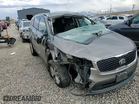 2016 Kia Sorento LX z VIN 5XYPGDA51GG134435, wystawiony jako Copart lot #54789715 z przebiegiem 122 743 mil mil oraz Szkoda całkowita • Salvage title. Historia ofert i sprzedaży dostępna na DreamBid. Obrazek 14.