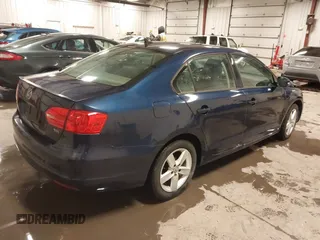 2012 Volkswagen Jetta Sedan TDI with VIN 3VW3L7AJ8CM378733, listed as a IAAI auction lot 41571197 with 151,159 mi miles. Bid and sale history available at carsss.com. Image 4.