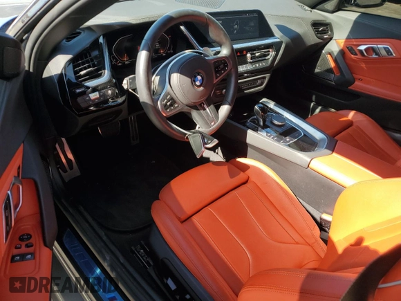 2024 BMW Z4 sDrive30i with VIN WBAHF3C06RWY36286, listed as a Copart auction lot 50296565 with 9,898 mi miles and Salvage title. Bid and sale history available at DreamBid. Image 8.