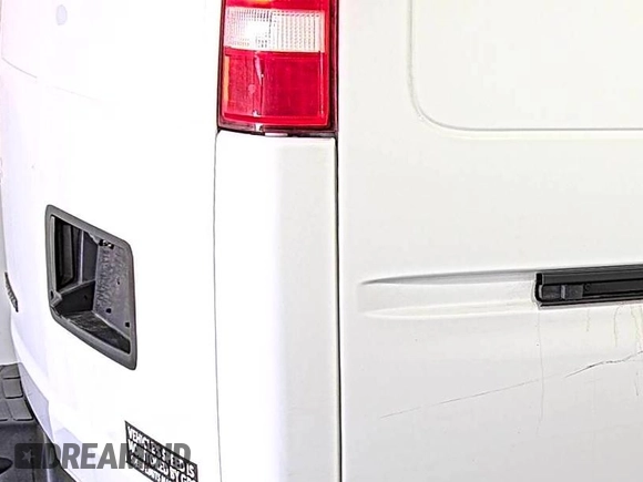 2021 Chevrolet Express Cargo with VIN 1GCWGAFP2M1303152, listed as a IAAI auction lot 42672934 with 68,671 mi miles and . Bid and sale history available at DreamBid. Image 4.