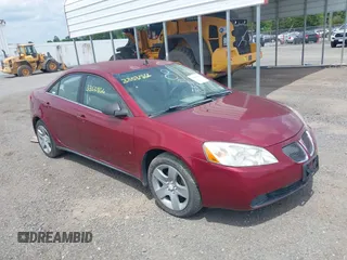 2009 Pontiac G6 w/1SA *Ltd Avail* with VIN 1G2ZG57B294162357, listed as a IAAI auction lot 39758349 with 106,764 mi miles. Bid and sale history available at carsss.com. Image 1.