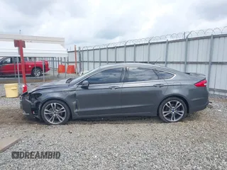 2017 Ford Fusion Titanium with VIN 3FA6P0K98HR363360, listed as a IAAI auction lot 42461432 with 182,807 mi miles and . Bid and sale history available at DreamBid. Image 14.