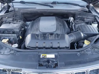 2014 Jeep Grand Cherokee Overland with VIN 1C4RJFCT8EC380899, listed as a IAAI auction lot 41372034 with 140,413 mi miles. Bid and sale history available at carsss.com. Image 10.