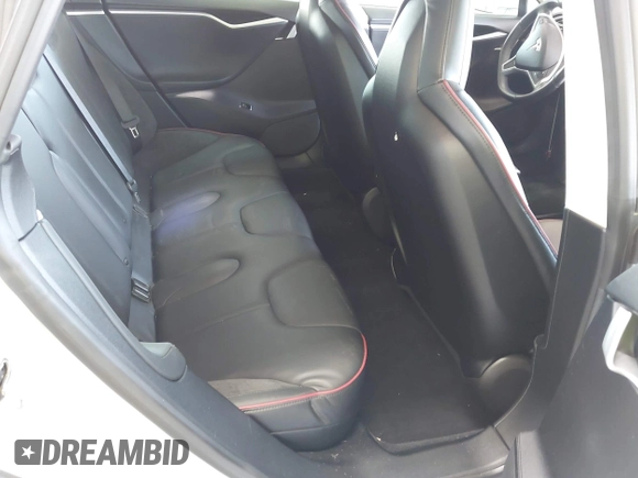 2013 Tesla Model S Performance with VIN 5YJSA1DP6DFP07999, listed as a IAAI auction lot 42284612 with 123,261 mi miles and . Bid and sale history available at DreamBid. Image 8.