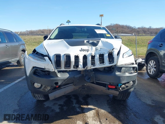 2018 Jeep Cherokee Trailhawk with VIN 1C4PJMBX7JD550173, listed as a IAAI auction lot 41094306 with 74,128 mi miles. Bid and sale history available at carsss.com. Image 12.
