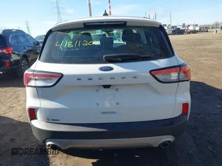 2021 Ford Escape S z VIN 1FMCU9F67MUA99055, wystawiony jako IAAI lot #41811206 z przebiegiem 56 760 mil mil oraz . Historia ofert i sprzedaży dostępna na DreamBid. Obrazek 17.