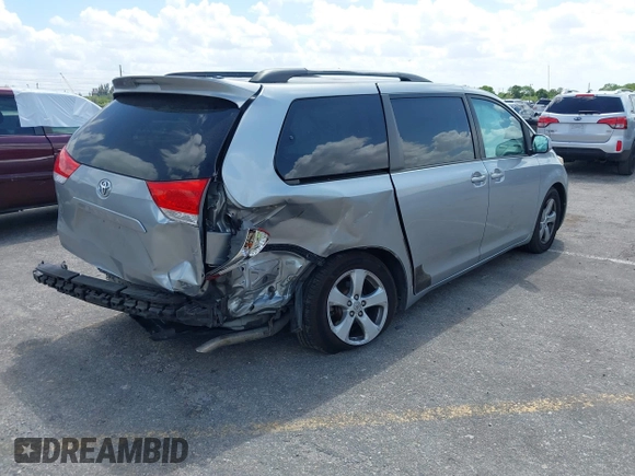 2013 Toyota Sienna LE AAS with VIN 5TDKK3DC4DS399295, listed as a IAAI auction lot 42173970 with 128,350 mi miles and . Bid and sale history available at DreamBid. Image 4.