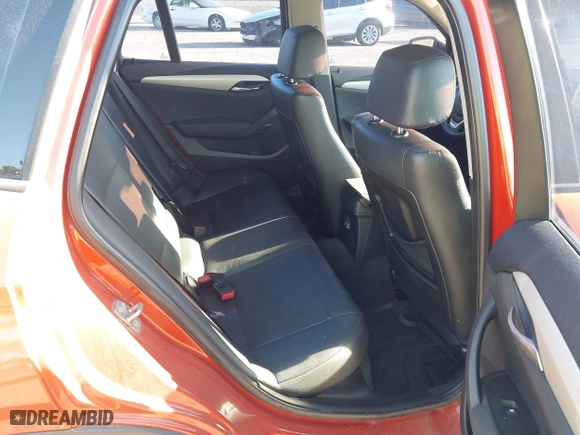 2013 BMW X1 28i with VIN WBAVM1C58DVW45105, listed as a IAAI auction lot 42049919 with 141,020 mi miles. Bid and sale history available at carsss.com. Image 8.
