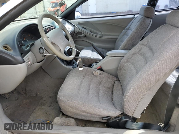 1998 Ford Mustang with VIN 1FAFP4041WF104623, listed as a Copart auction lot 50089825 with 189,313 mi miles and Salvage title. Bid and sale history available at DreamBid. Image 7.