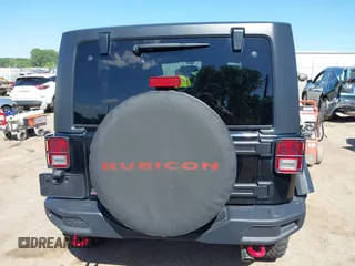 2015 Jeep Wrangler Rubicon Hard Rock with VIN 1C4BJWCG1FL610028, listed as a IAAI auction lot 42318569 with 48,627 mi miles and . Bid and sale history available at DreamBid. Image 16.