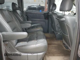 2003 Honda Odyssey EX-L z VIN 5FNRL18993B142649, wystawiony jako Copart lot #86397154 z przebiegiem 339 966 mil mil oraz Szkoda całkowita • Salvage title. Historia ofert i sprzedaży dostępna na DreamBid. Obrazek 11.