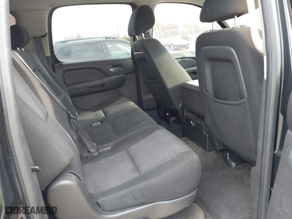 2010 Chevrolet Suburban Commercial with VIN 1GNUKHE38AR190423, listed as a IAAI auction lot 41361377 with 215,187 mi miles. Bid and sale history available at carsss.com. Image 8.