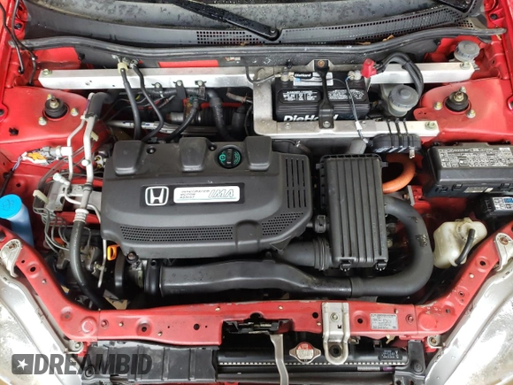 2001 Honda Insight z VIN JHMZE13511T001064, wystawiony jako Copart lot #80708784 z przebiegiem 46 392 mil mil oraz Szkoda całkowita • Salvage title. Historia ofert i sprzedaży dostępna na DreamBid. Obrazek 11.