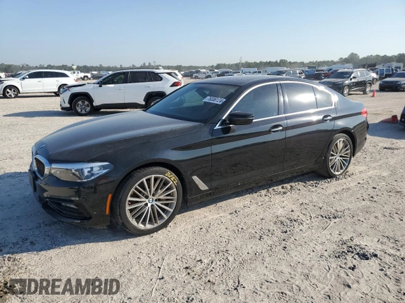 2018 BMW 5 Series 530i with VIN WBAJA5C54JG899845, listed as a Copart auction lot 76386124 with 57,379 mi miles and Salvage Title. Bid and sale history available at DreamBid. Image 1.