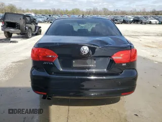 2014 Volkswagen Jetta Sedan SE with VIN 3VWD17AJ8EM392001, listed as a Copart auction lot 51124475 with 131,766 mi miles and Salvage Title. Bid and sale history available at carsss.com. Image 6.