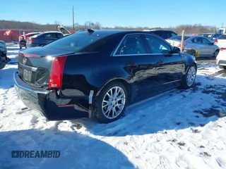 2013 Cadillac CTS Premium z VIN 1G6DS5E34D0160676, wystawiony jako IAAI lot #41262795 z przebiegiem 122 248 mil mil oraz . Historia ofert i sprzedaży dostępna na DreamBid. Obrazek 4.