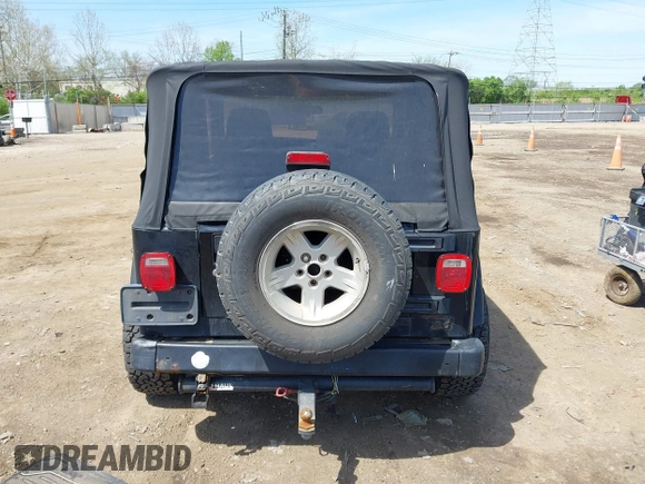 2006 Jeep Wrangler Sport with VIN 1J4FA49S76P718349, listed as a IAAI auction lot 42098356 with 137,804 mi miles and . Bid and sale history available at carsss.com. Image 16.
