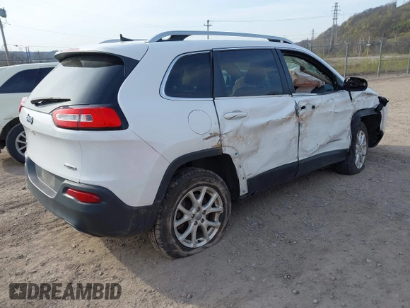 2016 Jeep Cherokee Latitude with VIN 1C4PJMCS1GW242545, listed as a IAAI auction lot 42048421 with 84,667 mi miles and . Bid and sale history available at carsss.com. Image 4.