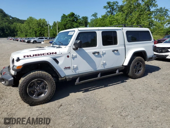 2023 Jeep Gladiator Rubicon with VIN 1C6JJTBG9PL546437, listed as a Copart auction lot 62536575 with 14,106 mi miles and Salvage title. Bid and sale history available at DreamBid. Image 1.