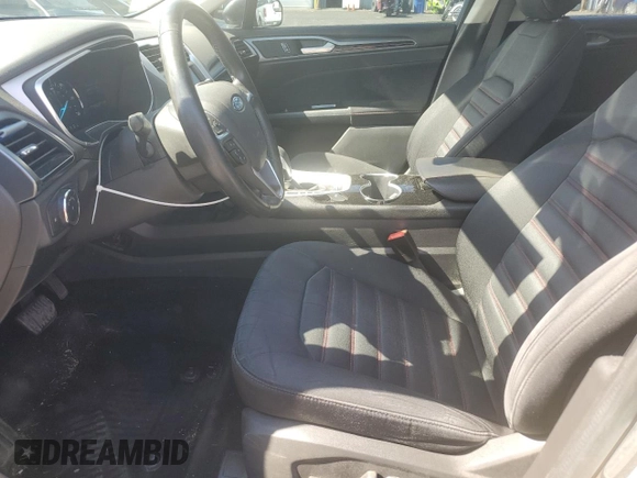 2016 Ford Fusion SE Hybrid z VIN 3FA6P0LU3GR173886, wystawiony jako Copart lot #60066015 z przebiegiem 140 328 mil mil oraz Szkoda całkowita • Salvage title. Historia ofert i sprzedaży dostępna na DreamBid. Obrazek 7.
