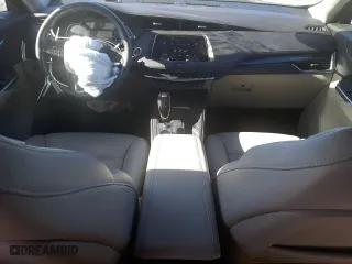 2023 Cadillac XT4 FWD Premium Luxury with VIN 1GYFZCR43PF158499, listed as a Copart auction lot 58021974 with 9,497 mi miles and Salvage Title. Bid and sale history available at carsss.com. Image 8.