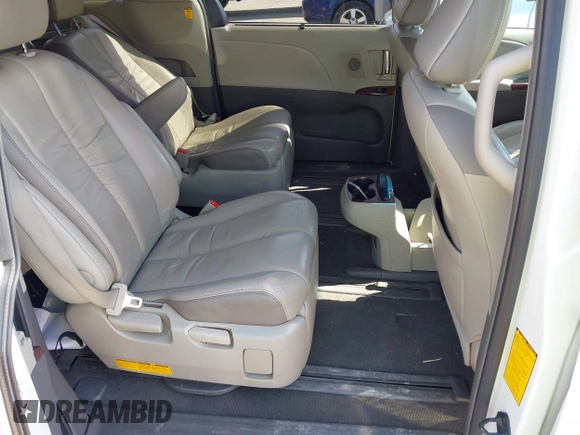 2011 Toyota Sienna XLE AAS with VIN 5TDYK3DC7BS054012, listed as a IAAI auction lot 41752182 with 123,226 mi miles and . Bid and sale history available at DreamBid. Image 8.