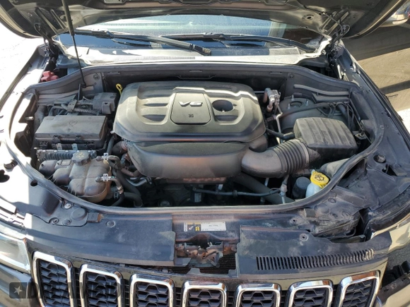 2018 Jeep Grand Cherokee Limited with VIN 1C4RJFBG5JC488542, listed as a Copart auction lot 52099495 with 57,305 mi miles and Salvage Title. Bid and sale history available at DreamBid. Image 12.