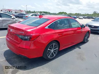 2023 Honda Civic Touring with VIN 2HGFE1F94PH323451, listed as a IAAI auction lot 42383422 with 6,120 mi miles and . Bid and sale history available at DreamBid. Image 4.