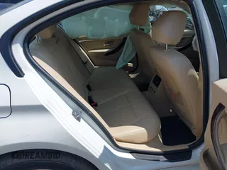 2015 BMW 3 Series 328i xDrive with VIN WBA3B5G56FNS15848, listed as a IAAI auction lot 42537645 with 121,742 mi miles and . Bid and sale history available at DreamBid. Image 8.