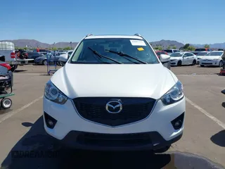 2015 Mazda CX-5 Grand Touring with VIN JM3KE2DYXF0493370, listed as a IAAI auction lot 42087156 with 161,464 mi miles. Bid and sale history available at carsss.com. Image 12.