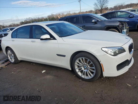 2015 BMW 7 Series 740Li xDrive with VIN WBAYF4C58FGS99427, listed as a Copart auction lot 84991474 with 83,008 mi miles and Salvage Title. Bid and sale history available at carsss.com. Image 4.