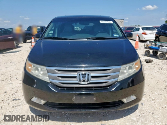 2011 Honda Odyssey Touring with VIN 5FNRL5H90BB033700, listed as a Copart auction lot 58602835 with 197,063 mi miles and Clean title. Bid and sale history available at DreamBid. Image 5.