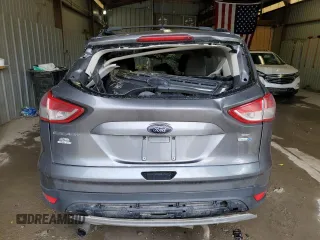 2013 Ford Escape SE с VIN 1FMCU9GX5DUA38746, выставлен на аукционе Copart как лот 56034105 с пробегом Не указан миль и Списание • Salvage title. История ставок и продаж доступна на DreamBid. Изображение 6.