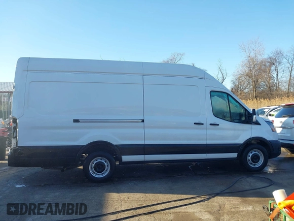 2020 Ford Transit Cargo with VIN 1FTBW3X82LKA91396, listed as a IAAI auction lot 41310803 with 60,760 mi miles and . Bid and sale history available at DreamBid. Image 13.
