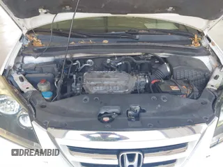 2005 Honda Odyssey EX with VIN 5FNRL38415B010150, listed as a IAAI auction lot 42844859 with 174,421 mi miles and . Bid and sale history available at DreamBid. Image 10.